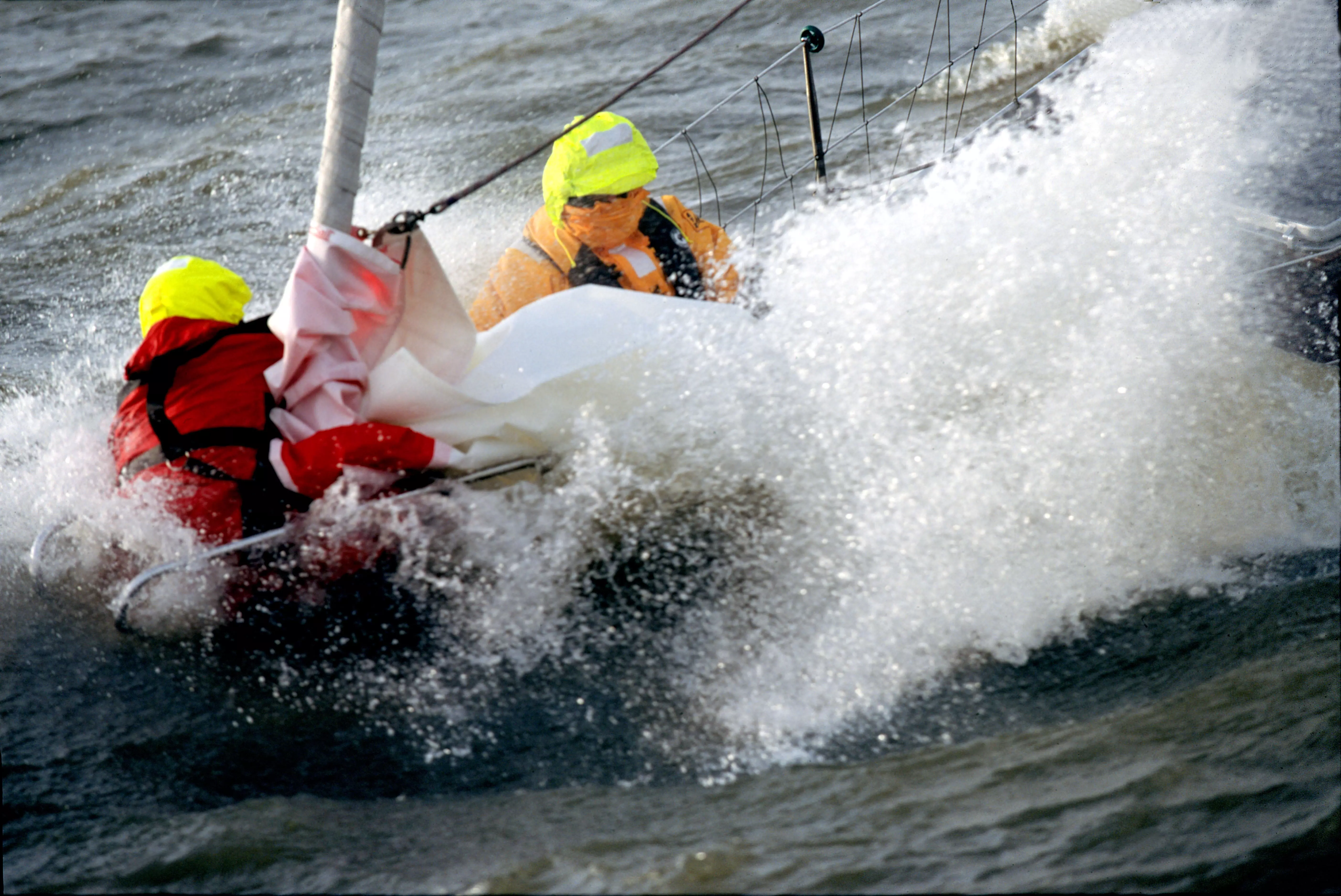 Sailboat under storm canvas in heavy weather