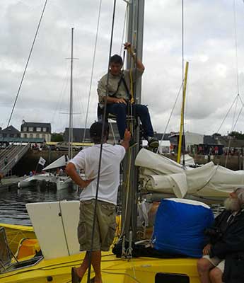 Showing the ATN Mastclimber to Loick Peyron before the 2014 Route du Rhum