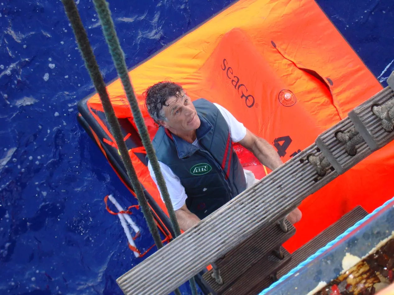 Etienne Giroire climbing aboard the ship CMA-CGM Fort St Georges, 1350 miles from the West Indies