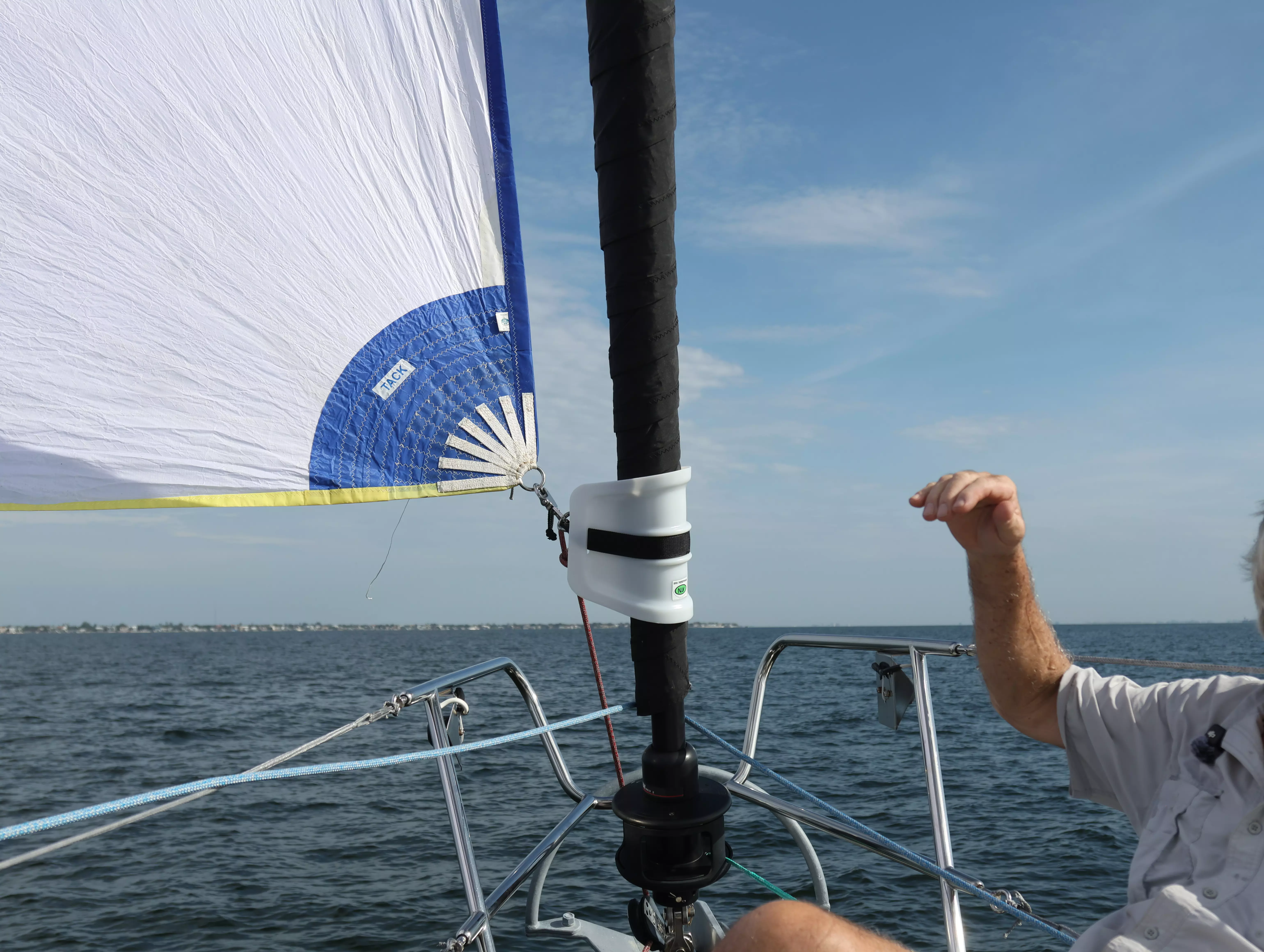 ATN Tacker carabiner closure around furled headsail