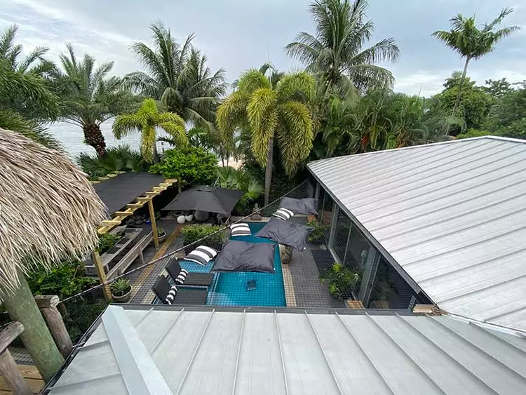 Custom SuperTramp pool cover with trim at a Miami Beach home