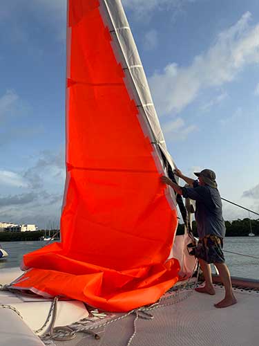 Raising the ATN Gale Sail over a furled headsail