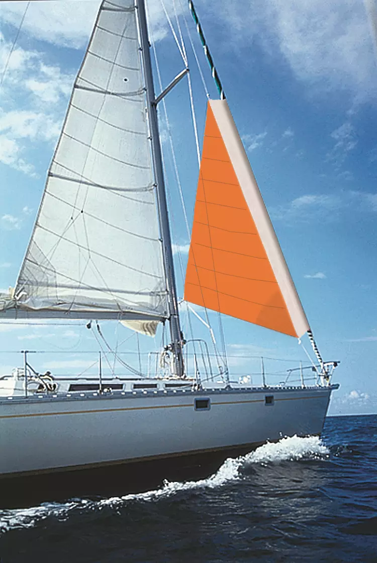 ATN Gale Sail hoisted over a furled genoa in heavy gray conditions
